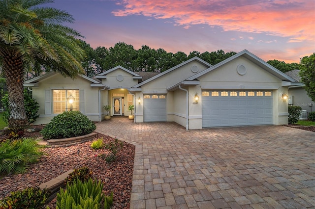 ranch-style home with a garage