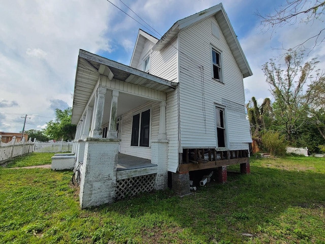 view of home's exterior with a yard