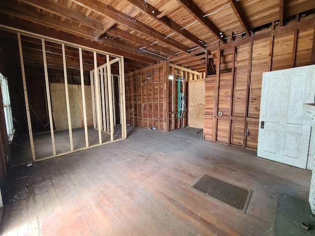 miscellaneous room featuring dark wood-type flooring