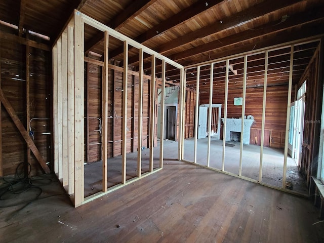 misc room featuring wood ceiling and wood-type flooring