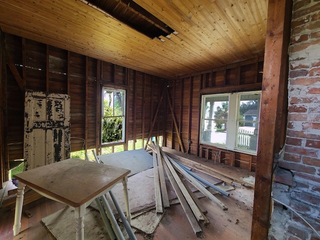 miscellaneous room with brick wall