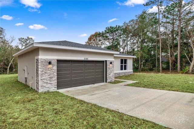 exterior space with a front lawn and a garage