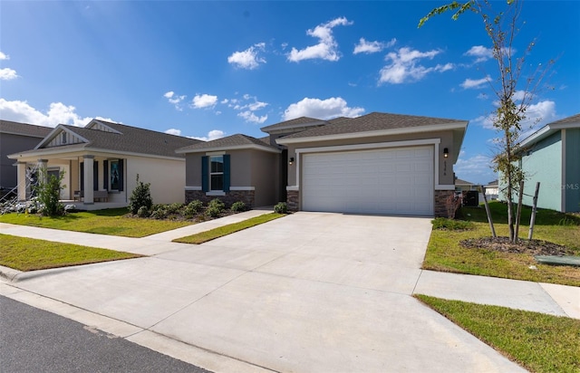 view of front of house with a front lawn and a garage