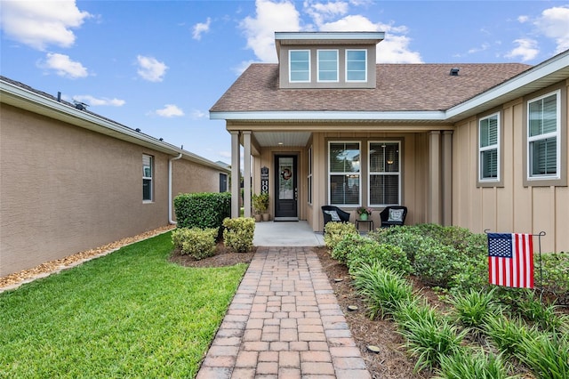 property entrance featuring a yard