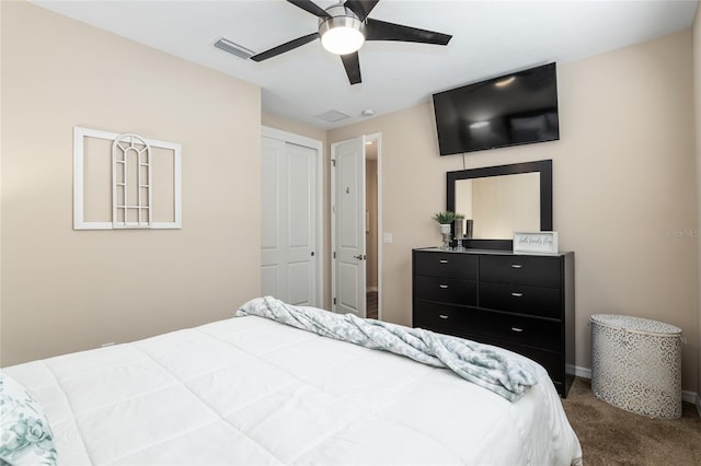 bedroom with carpet, a closet, and ceiling fan