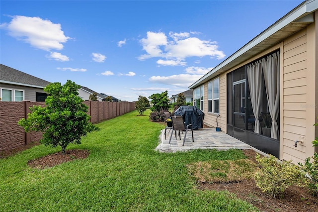 view of yard with a patio area