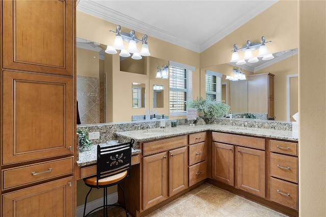 bathroom with tile patterned floors, vanity, vaulted ceiling, and ornamental molding