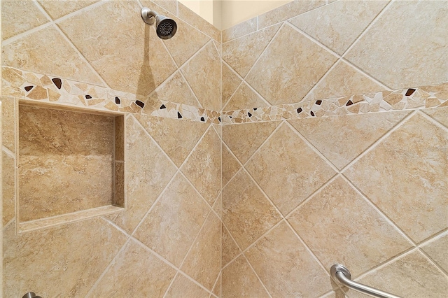 details featuring a tile shower