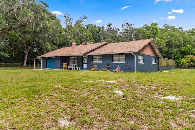 single story home with a front yard