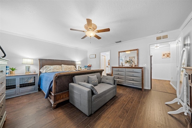 bedroom featuring a textured ceiling, ceiling fan, crown molding, and dark hardwood / wood-style floors