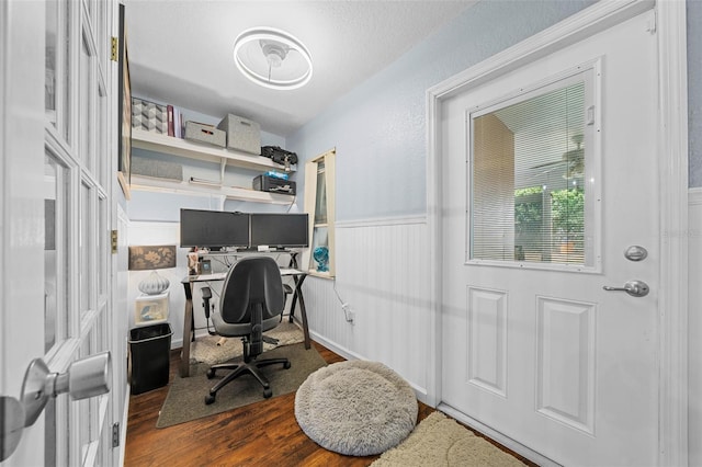 home office featuring dark hardwood / wood-style flooring