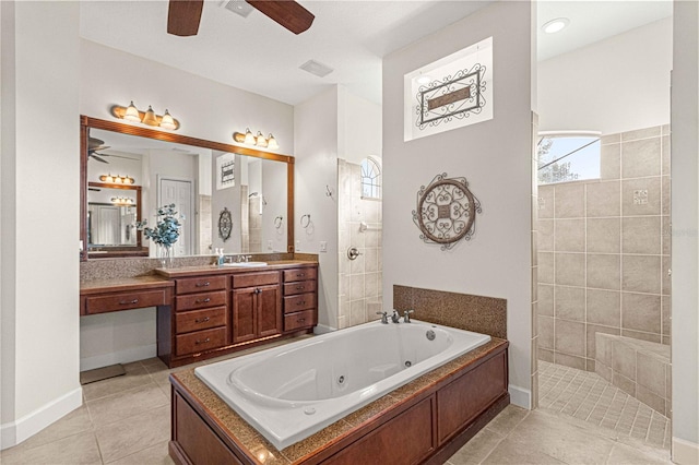 bathroom featuring tile patterned floors, vanity, and independent shower and bath