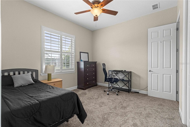 bedroom with light colored carpet and ceiling fan