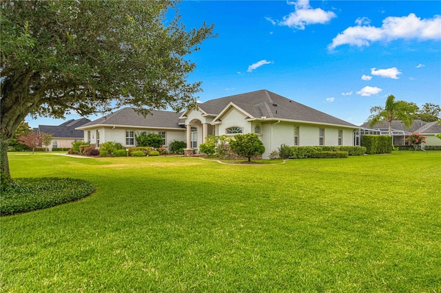 view of front of home with a front lawn