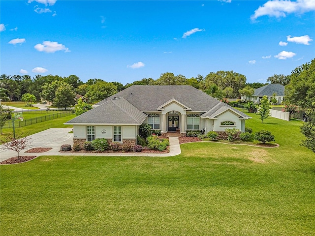 ranch-style house with a front lawn