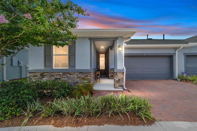 view of front of home featuring a garage