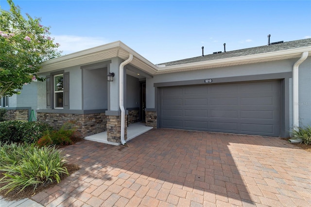 ranch-style home with a garage