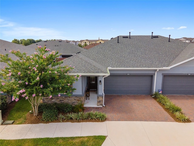 ranch-style home with a garage