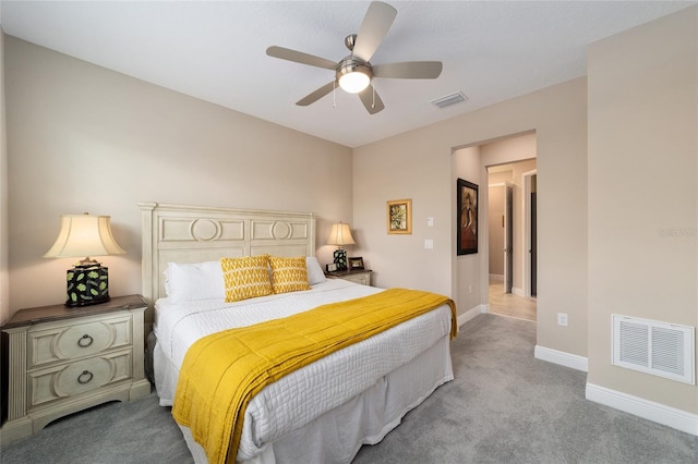 carpeted bedroom with ceiling fan