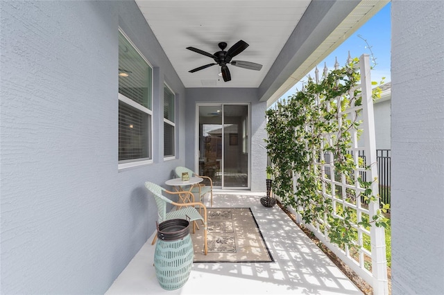 view of patio / terrace featuring ceiling fan