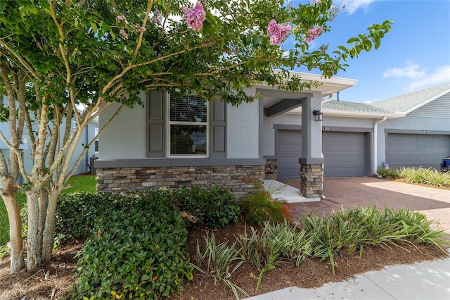 view of front of home with a garage