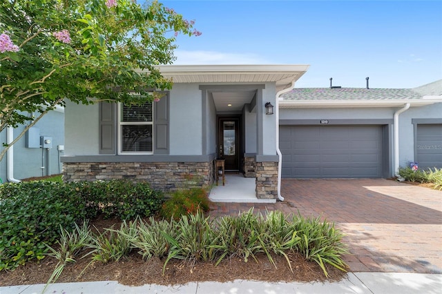 view of front of property with a garage