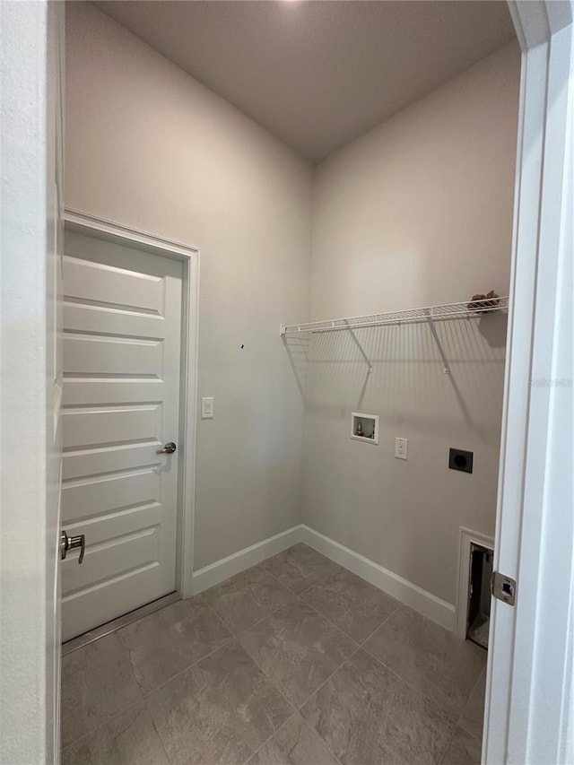 clothes washing area featuring washer hookup and electric dryer hookup