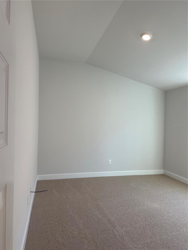 unfurnished room featuring carpet flooring