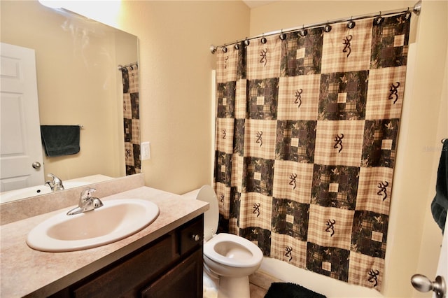 bathroom featuring tile patterned floors, vanity, toilet, and a shower with curtain