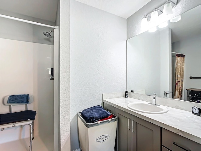 bathroom with vanity and a shower with curtain