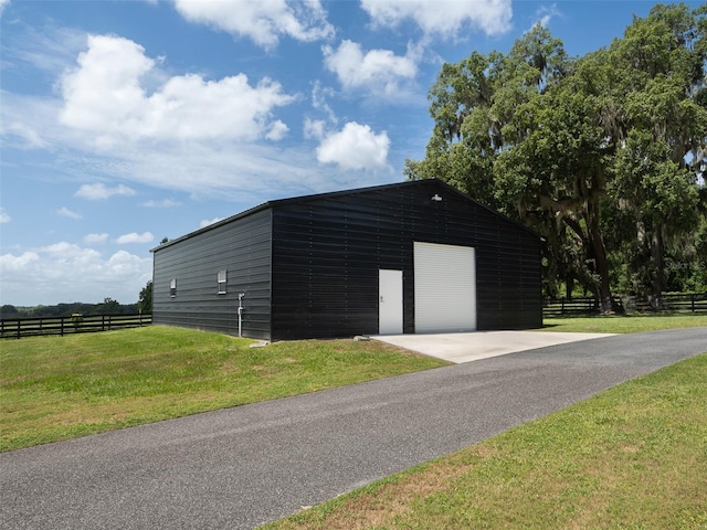 garage with a lawn