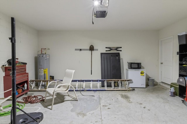 garage featuring fridge, water heater, and a garage door opener