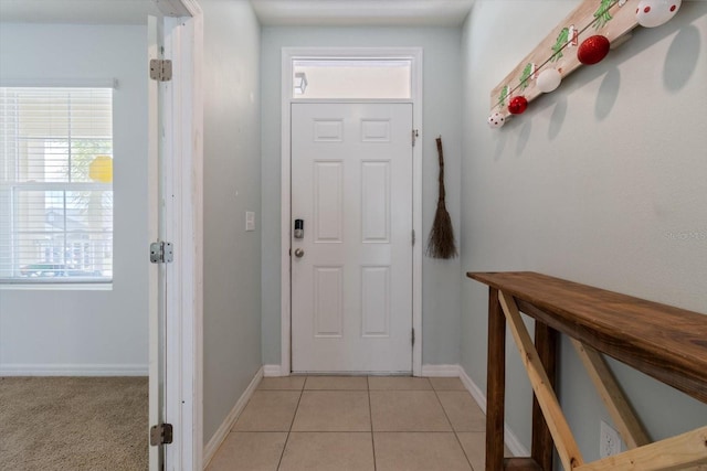 doorway featuring light tile patterned floors