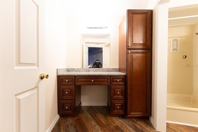 bathroom featuring hardwood / wood-style floors and vanity