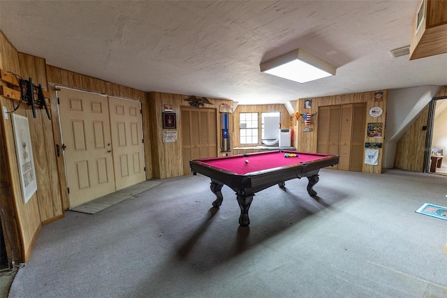 recreation room with wood walls, carpet floors, and pool table