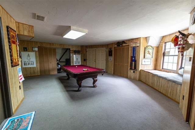 rec room featuring wood walls, light colored carpet, and pool table