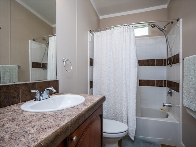 full bathroom with ornamental molding, oversized vanity, toilet, and shower / tub combo