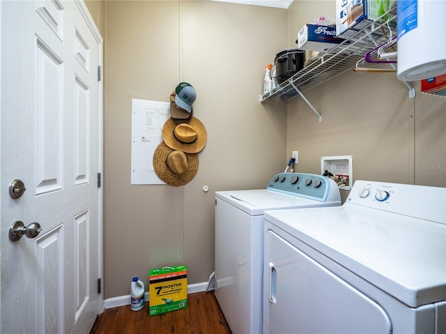 laundry area featuring hookup for a washing machine, separate washer and dryer, and dark wood-type flooring