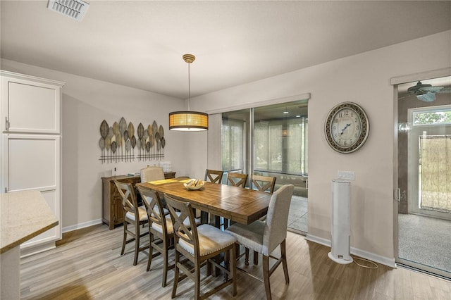 dining room featuring light hardwood / wood-style floors