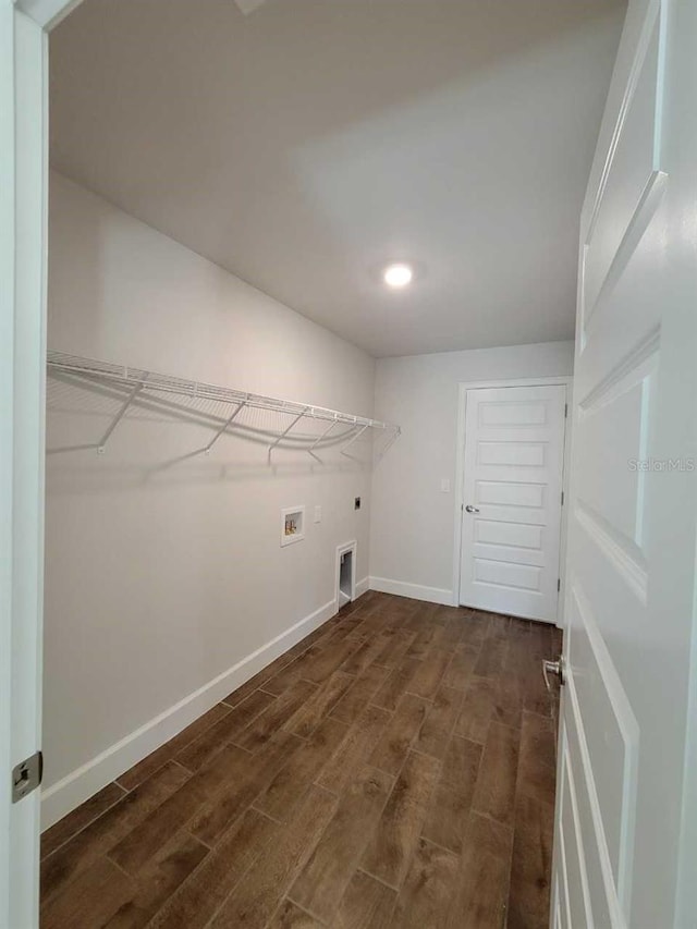 laundry area with washer hookup, hookup for an electric dryer, and dark wood-type flooring