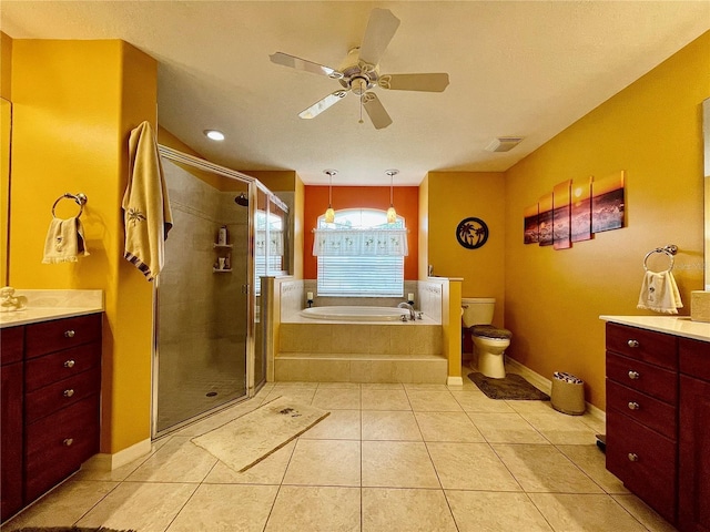 full bathroom featuring vanity, tile patterned flooring, ceiling fan, toilet, and shower with separate bathtub