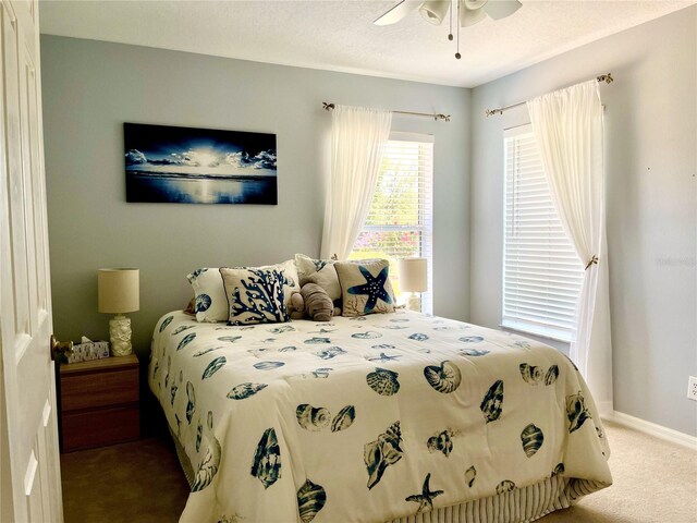 bedroom featuring carpet flooring and ceiling fan