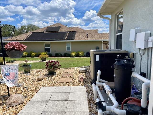 view of yard with central AC