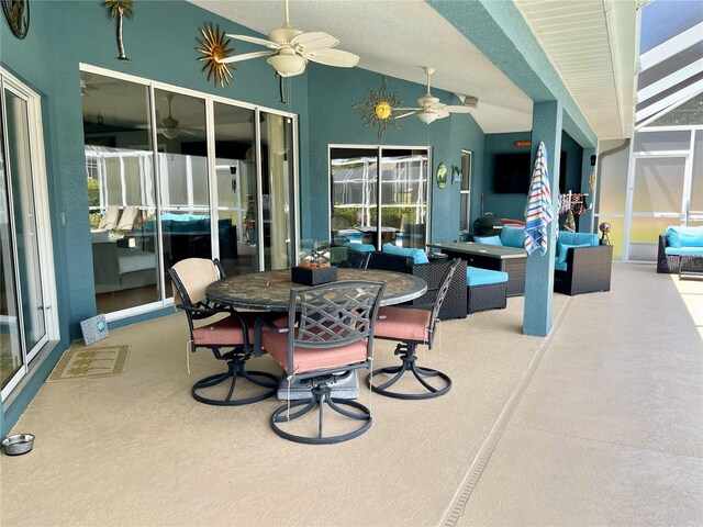 view of patio featuring an outdoor living space and ceiling fan