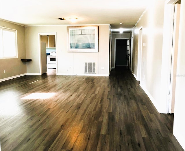 unfurnished living room featuring dark hardwood / wood-style floors and crown molding