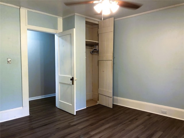 unfurnished bedroom featuring ornamental molding, dark hardwood / wood-style flooring, and ceiling fan