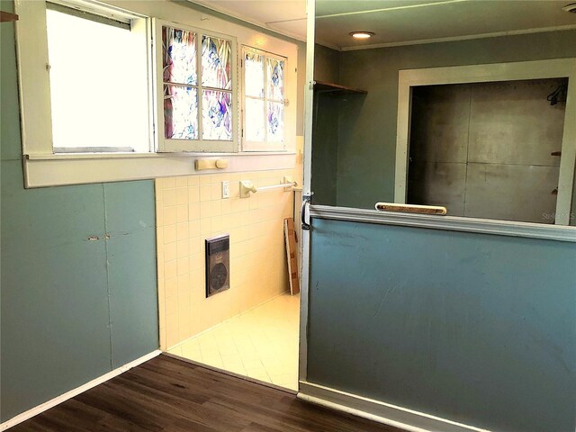 bathroom with hardwood / wood-style flooring