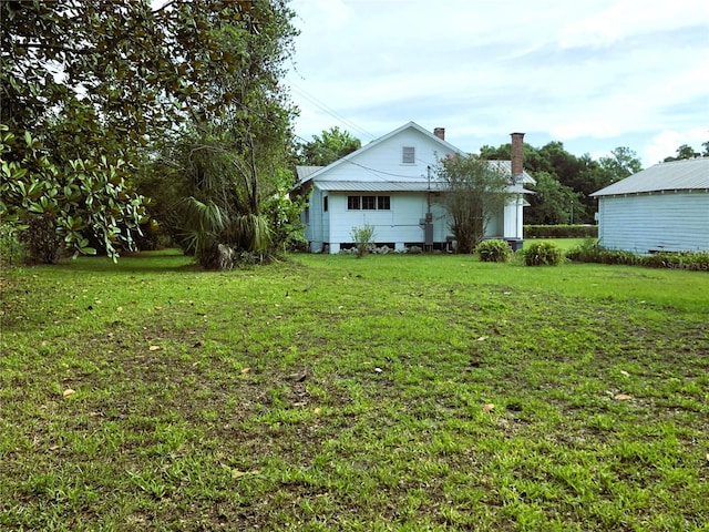 exterior space with a lawn