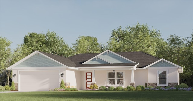 view of front of house featuring a garage, a front lawn, and covered porch