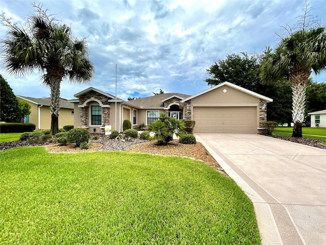 ranch-style home featuring a garage and a front yard